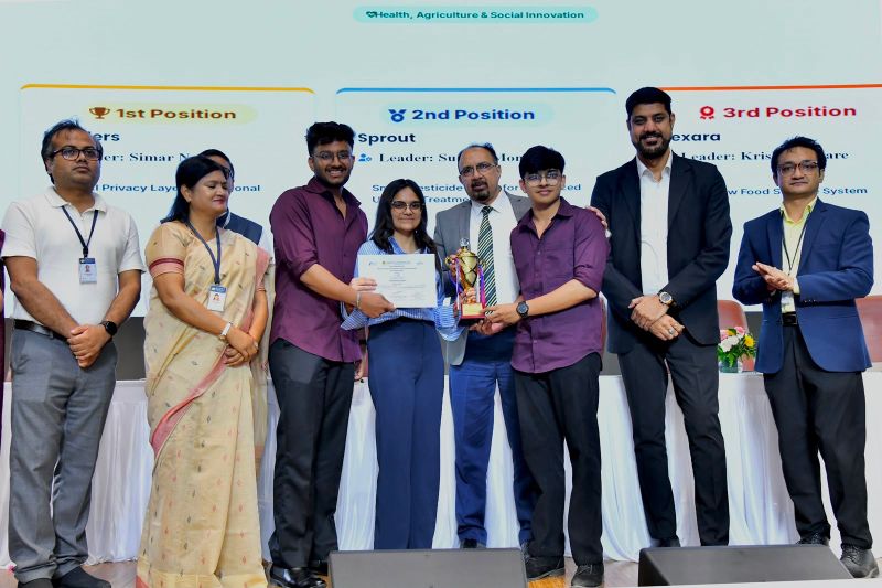 Ojaswi Singh's team receiving the trophy on stage at Amity Ideathon 2026